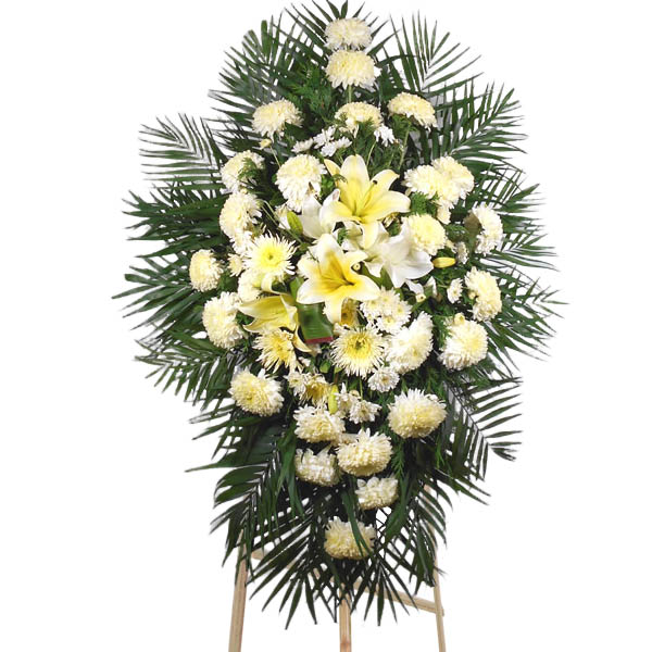corona funebre de 1 m. de diametro con rosas blancas lilis blancas gerberas blancas follaje verde