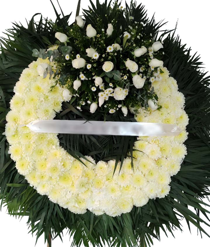 corona funebre grande de 1 m. de diametro con rosas, pompones,montecasino, palma y follaje