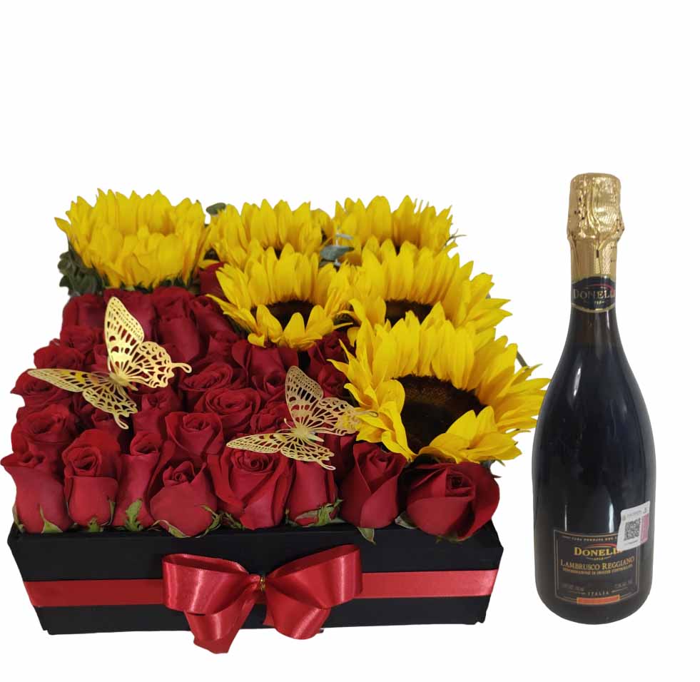 caja con girasoles,rosas y vino